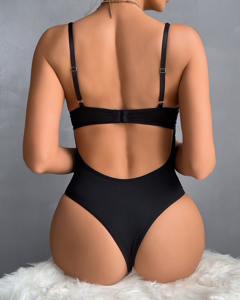 Retro Printed Mesh and PU Leather Cross-Strap Bow Bodysuit