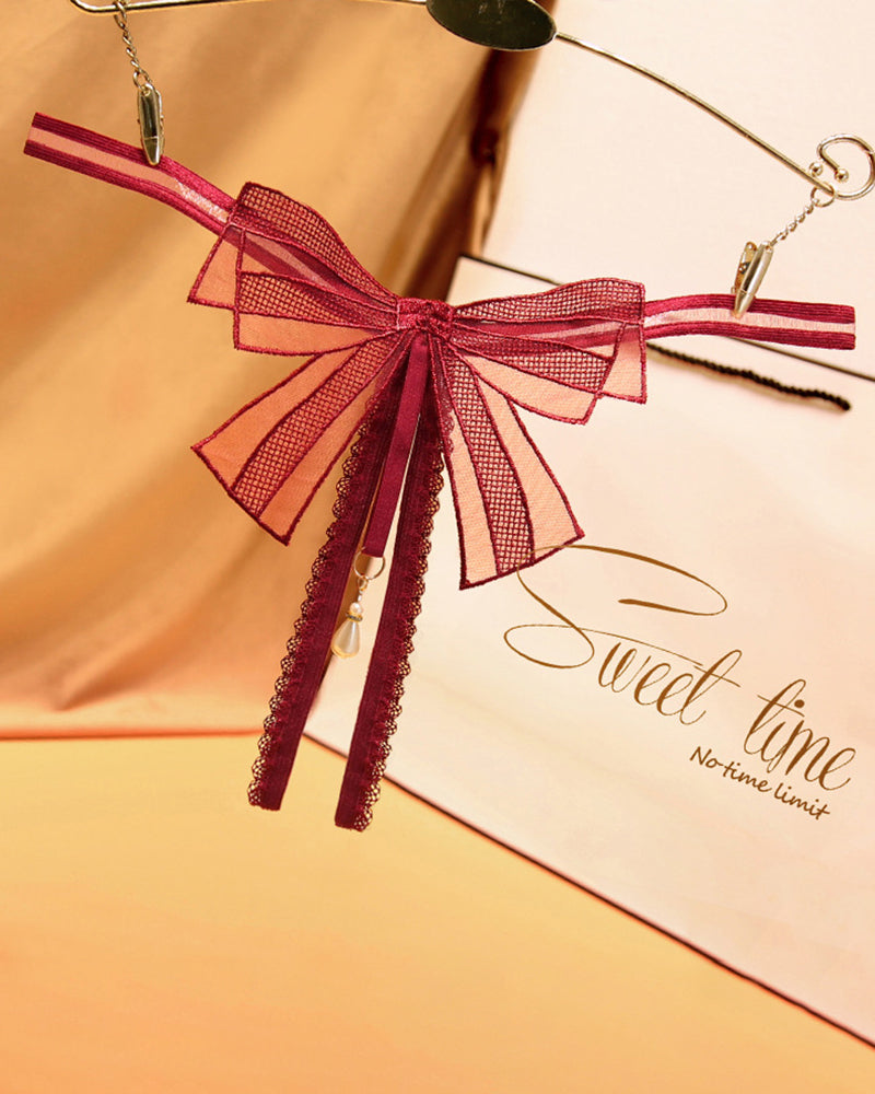 AVERLYN Bowknot Crotchless Beaded Thong