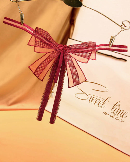 AVERLYN Bowknot Crotchless Beaded Thong